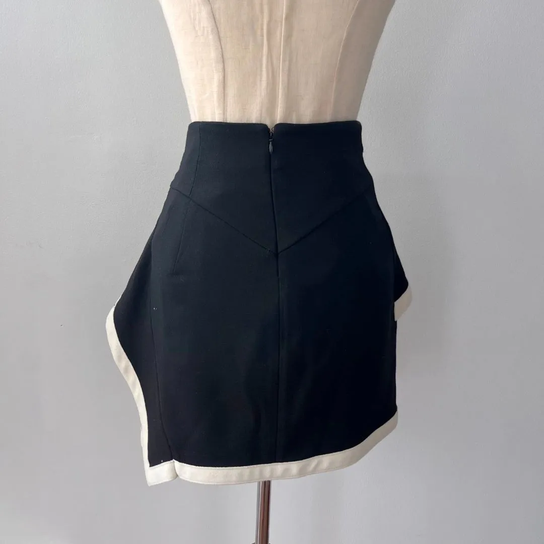 Alexander Mcqueen black mini skirt with layered detail, white trim detail