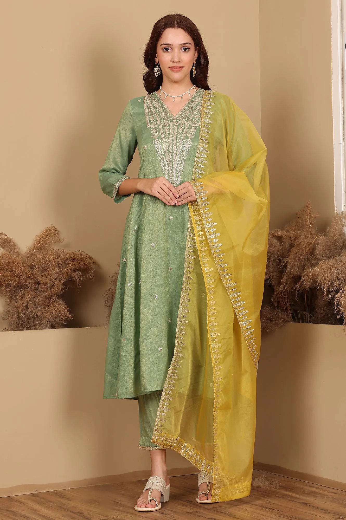 Green Metallic Embroidered Tissue Flared Kurta, Pants And Dupatta Set