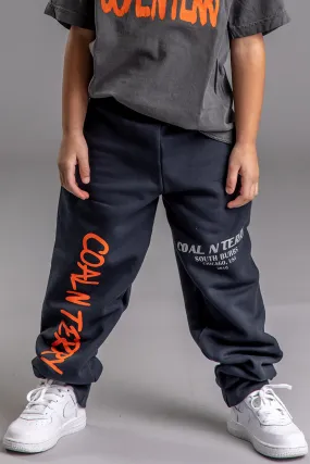KIDS BLK N ORANGE OVERLAY BURBS JOGGER