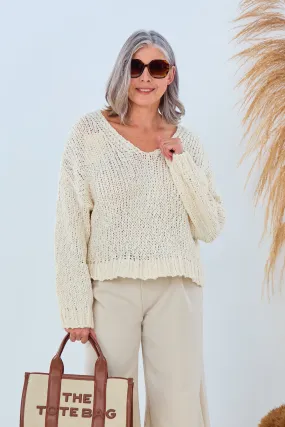 Süsser kurzer Strickpulli mit V-Ausschnitt, creme