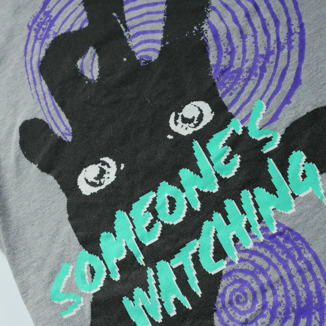 STUSSY SOMEONE'S WATCHING TEE  (S)