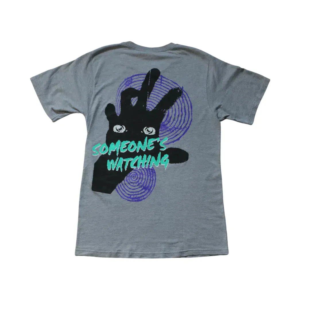 STUSSY SOMEONE'S WATCHING TEE  (S)