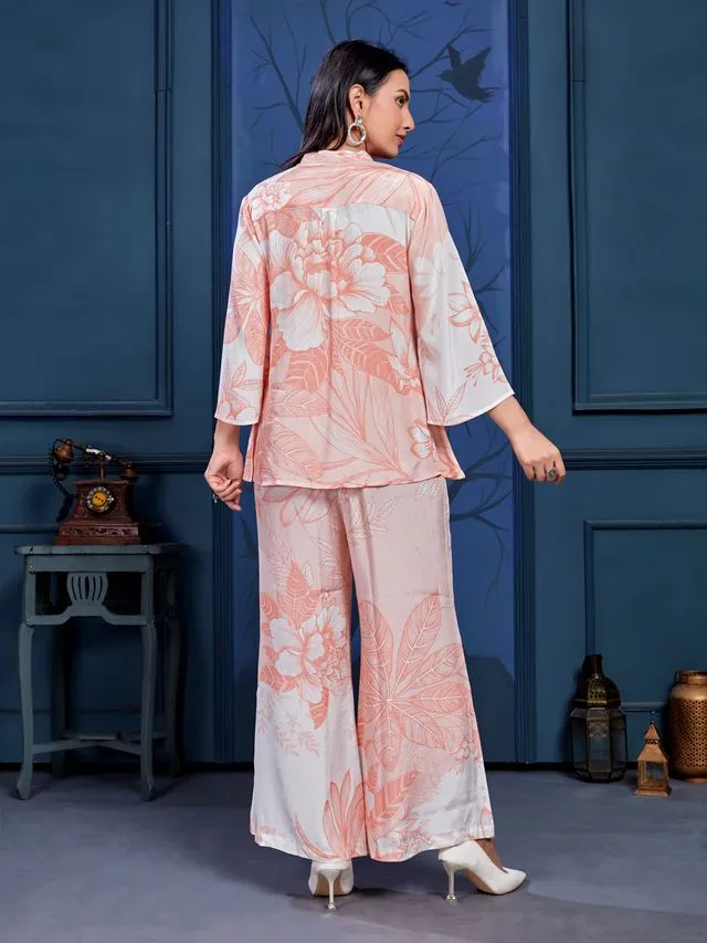 stylish monochromatic floral printed pure viscose natural crepe flare sleeves and mandarin collar neck tie-up drawstrings with tessels top pared with comfortable flare pants set - Peach